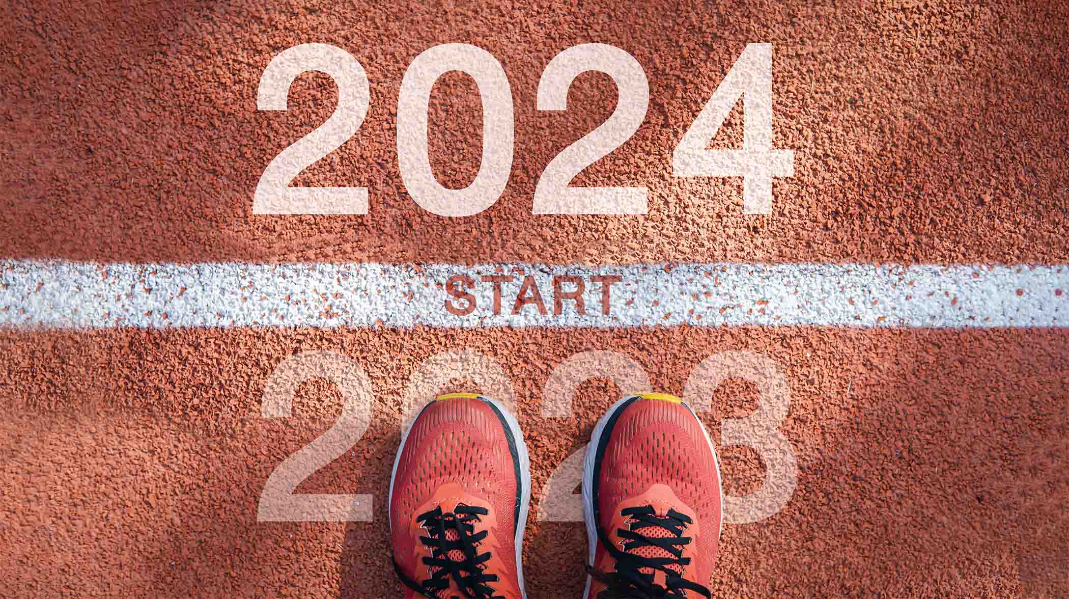 running shoes on 2023 to start 2024 on a track