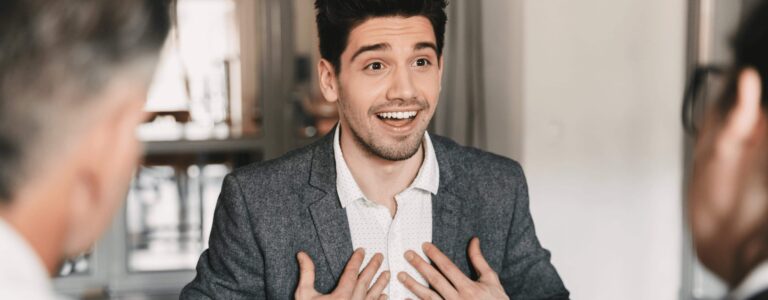 man at a real estate job interview