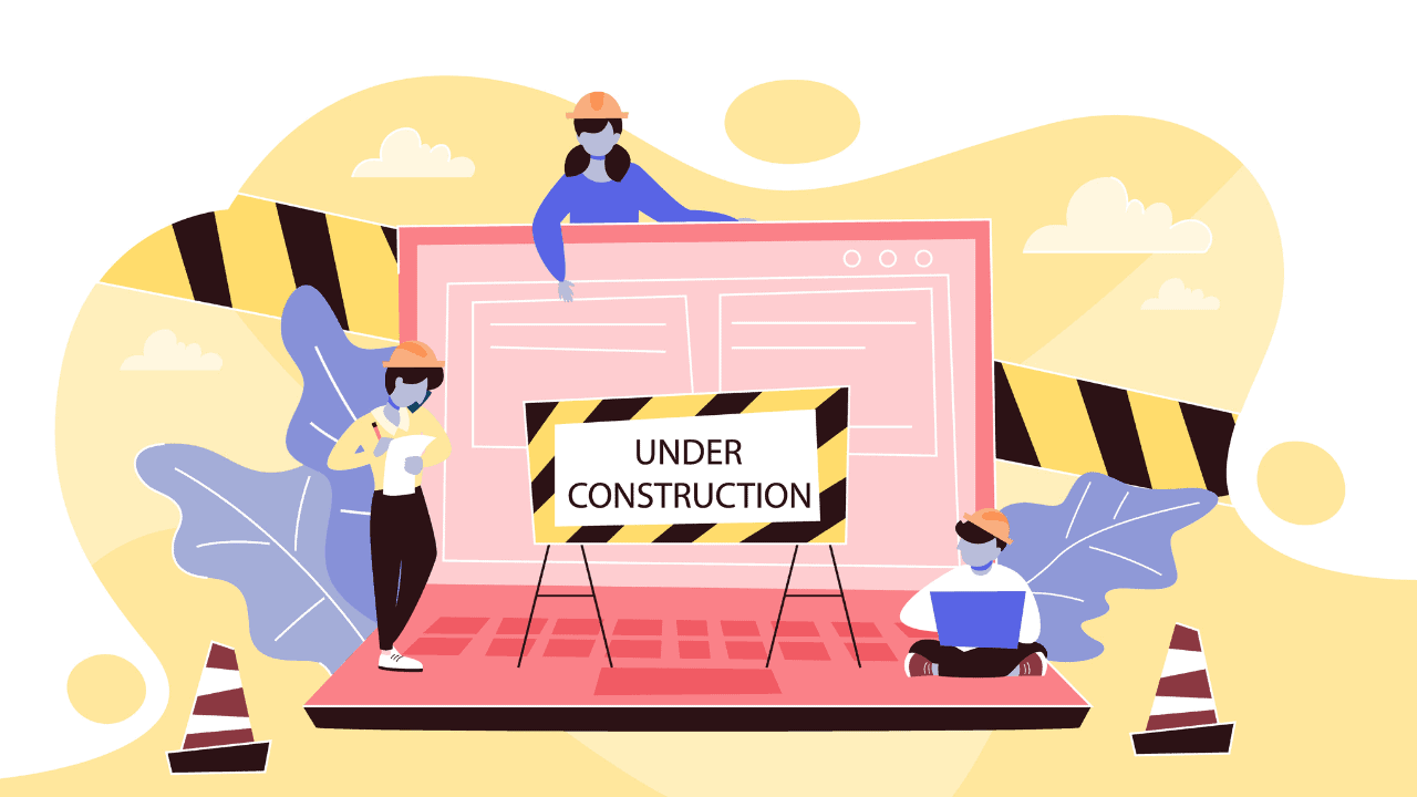 people working on an under construction computer