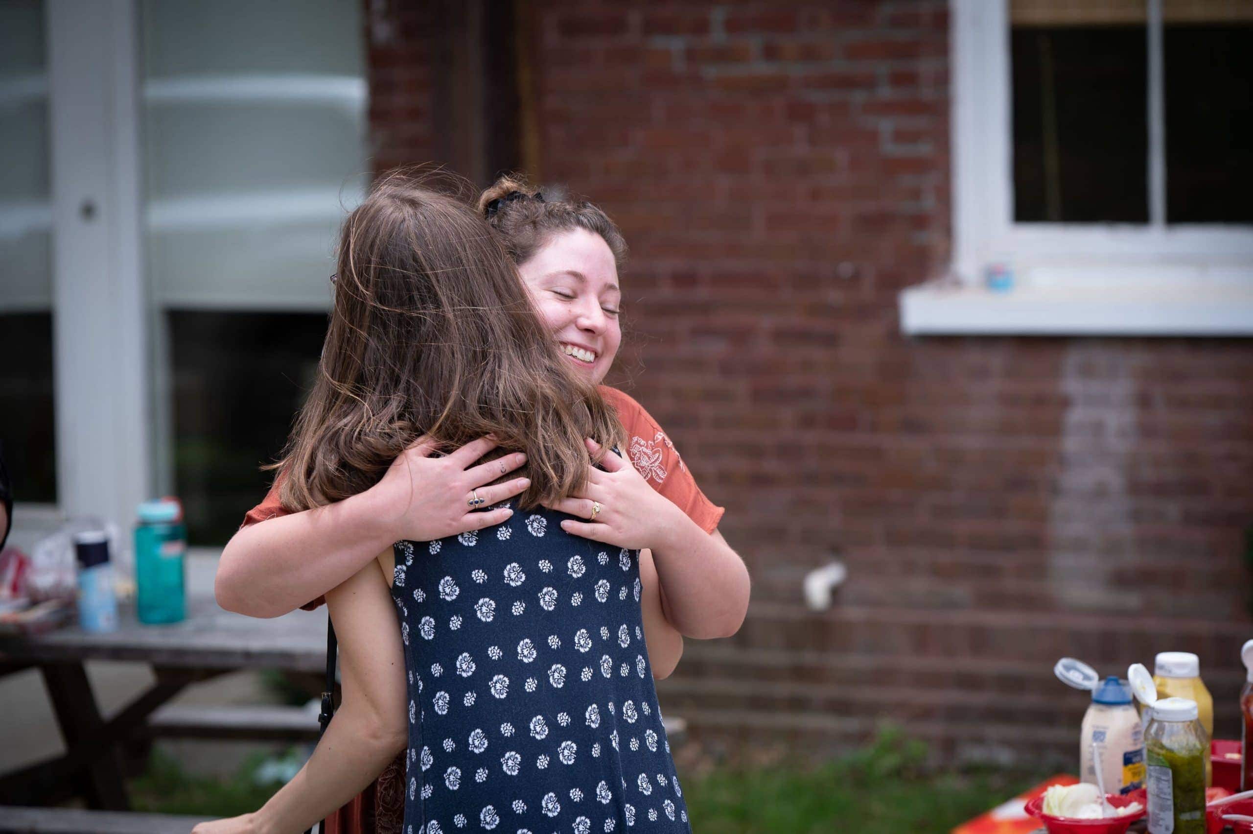 two women hugging union street media celebrating international womens day 2022
