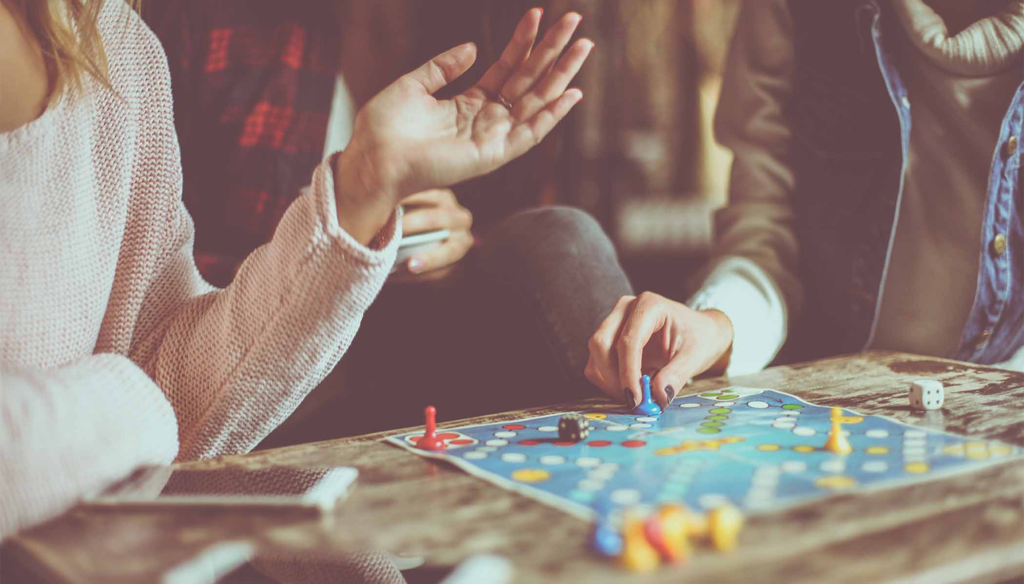 two people playing a board game